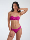 a model wearing cia. Maritima padded twisted bandeau bikini top